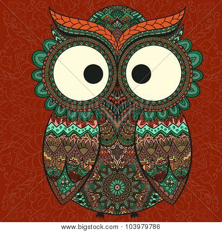 Ornamental owl on the patterned background.