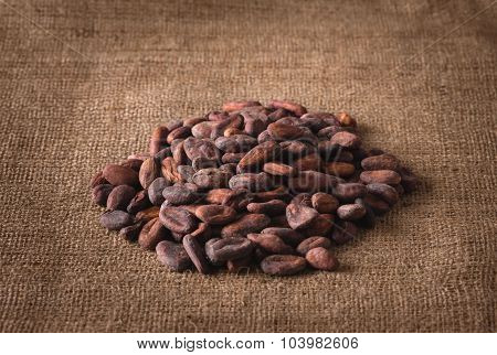Pile Of Raw Cocoa Beans On Sacking