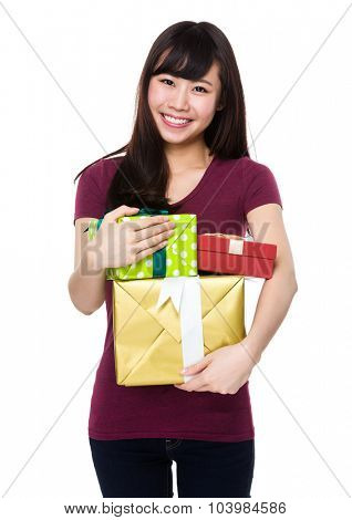 Asian Young Woman hold with many prsent box