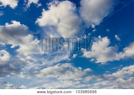 Fragment Of Sky With Cumulus Clouds And Cirrus Cloud