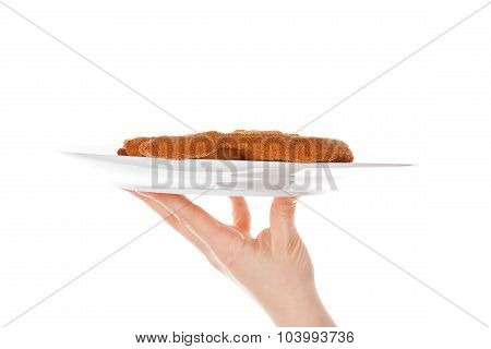 Serving Delicious Wiener Schnitzel on white background.