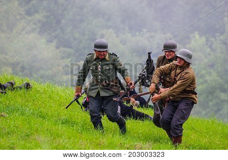 Soldiers with machine guns.The VIII International Festival of Military History and remake for the battle `1944` 6.08.2016 in Valga, Estonia