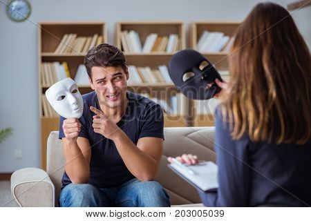 Man attending psychology therapy session with doctor