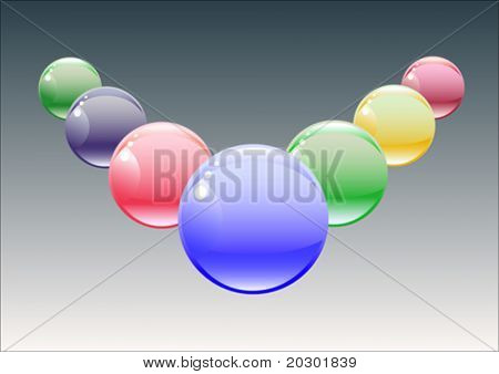 Boules de verre multicolores sont mis dans un certain nombre sur un fond noir et blanc