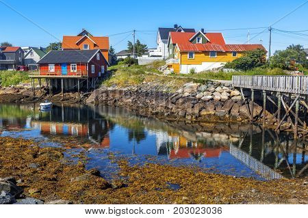 Scenic View Of Colorful Wooden Buildings In Henningsvaer In Summer.