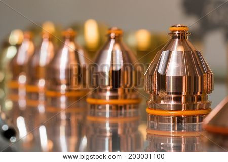 Replaceable nozzles for plasma cutting machine. Spare parts for equipment.