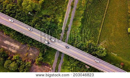 Aerial Photo Countryside Car Running on Road Bridge Over Railway Bypass route the City Drone Top View