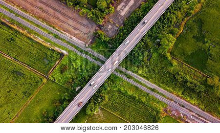 Aerial Photo Countryside Car Running on Road Bridge Over Railway Bypass route the City Drone Top View