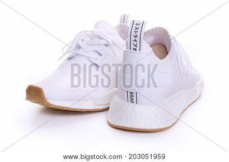 Kuala Lumpur, Malaysia - July 23, 2017: Rear view picture of a pair Adidas Original NMD R1 Gum Pack All White
