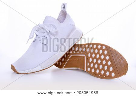 Kuala Lumpur, Malaysia - July 23, 2017: Rear view picture of a pair Adidas Original NMD R1 Gum Pack All White