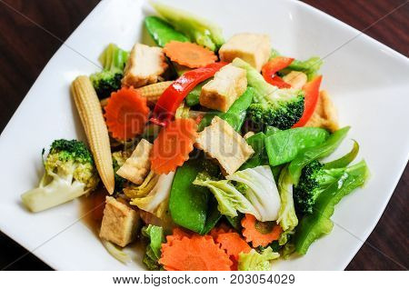 Stir-Fried Mixed Vegetables, Stir-fried broccoli, baby corn, carrots, peapods, napa and bell pepper in a soy sauce