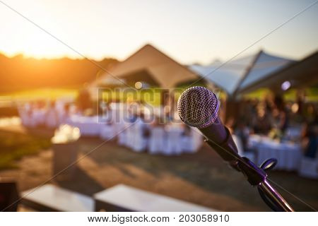 microphone close up on stage in the evening