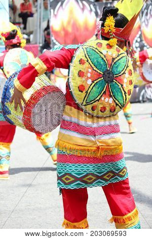 DAVAO CITY, PHILIPPINES--AUGUST 2014: Colorful costumes is one attraction to the parade each year.
Kadayawan is celebrated August each year to give thanks for life and an abundant harvest.