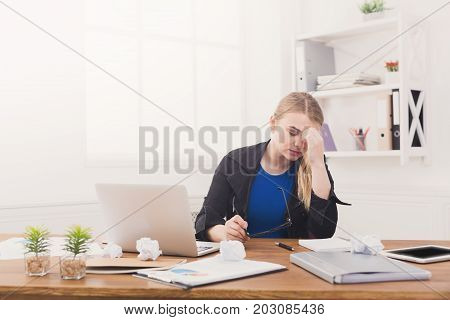 Tired pregnant businesswoman at office copy space. Expectant business lady feeling sick at work, gestosis concept