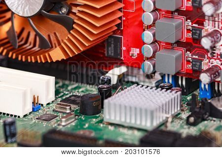 Closeup shot of modern motherboard and videocard
