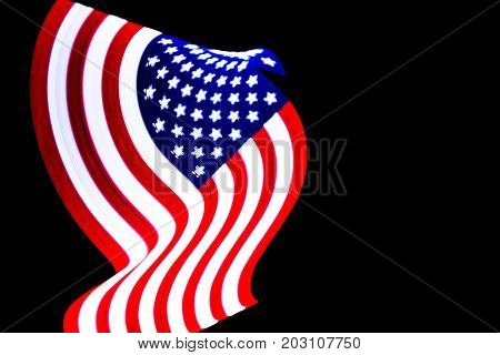 USA Flag lightpainted on black background texture