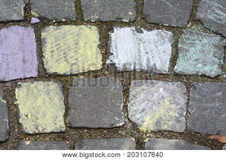 Paving stone with color hand drawing decoration