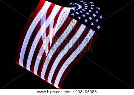USA Flag lightpainted on black background texture