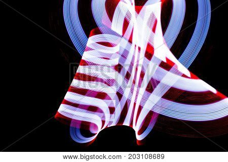 Red and white stripes lightpainted on black background