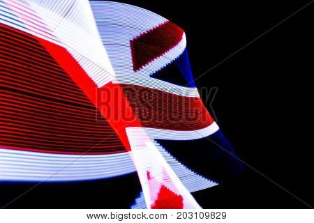 UK flag lightpainted on black background texture