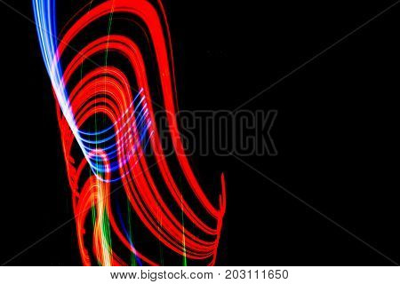 Lightpainting abstract background. Bright color light traces
