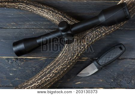 Black Optical Sight For Shooting With A Tourist Knife. A Sight For Sports Shooting.