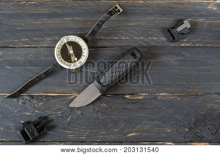 Knife, A Compass And A Flint For Breaking Fire.