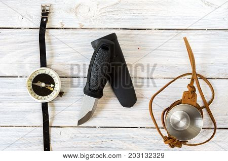 Knife With A Fixed Blade. A Glass In A Leather Case. Compass For Tourism.