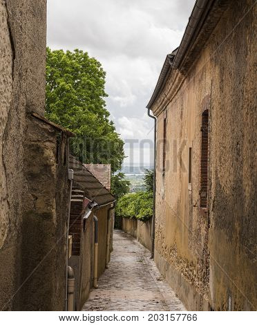 Small alley in Hautvillers in the Champagne district in France