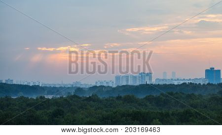 Pink Sunbeams In Sunrise Sky Over Moscow City