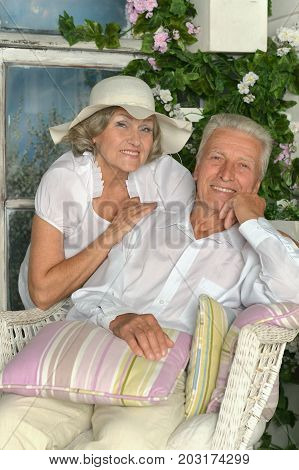 Portrait of amusing happy smiling old couple posing