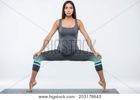 Pregnant Woman Practicing Yoga