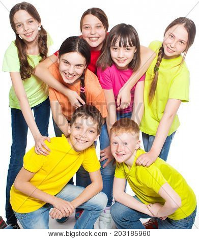 Happy group children in school. Smiling teen. Friedship boys and girls