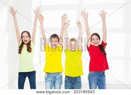 Happy group children in school. Smiling teen. Friedship boys and girls
