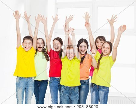 Happy group children in school. Smiling teen. Friedship boys and girls
