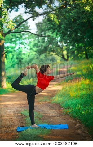 yoga; woman; female; girl; outdoors; sport; fitness; healthy lifestyle; Beautiful; nature; slim; beautiful girl; beautiful woman; Stretching; Mental Health; Caucasian; Activity; Body Care; Sports; Beauty And Health; yoga pose; Pilates; yoga practice; woma