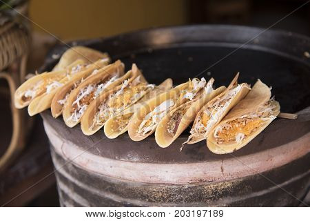 Khanom Buang are the names of the treats on the market