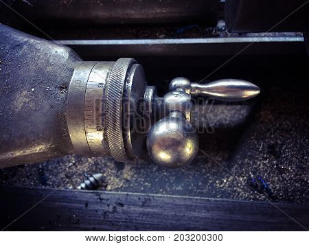 close up photo of metal lathe .