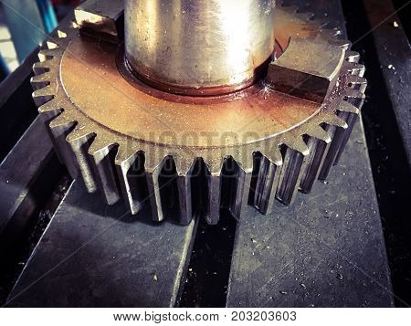close up photo of old rusty gear.