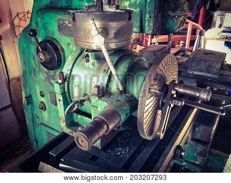 close up photo of metal lathe .