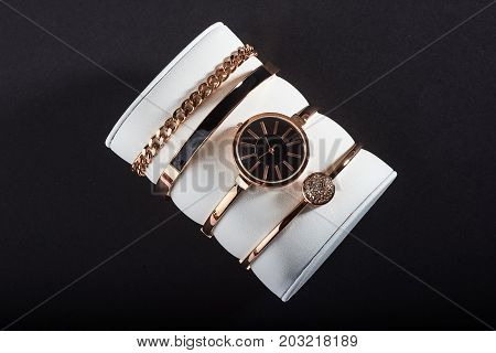 golden women's wrist watch on a white background.