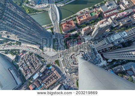 High buildings, river and office area in big city, top view at sunny day in Tianjin, China