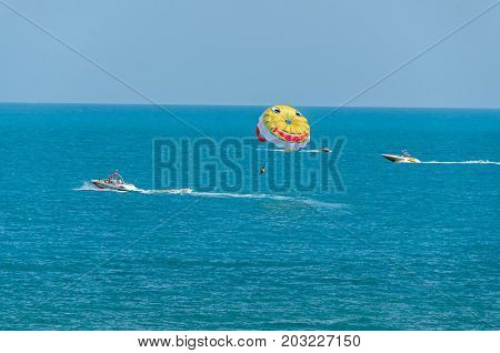 Albena, Bulgaria - June 15, 2017: Colored Parasail Wing Pulled By A Boat In The Sea Water, Parasaili