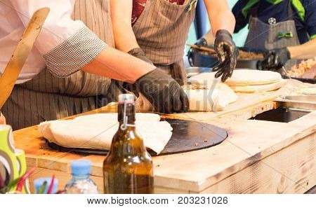 cooking a burrito on the street close up the holiday meal
