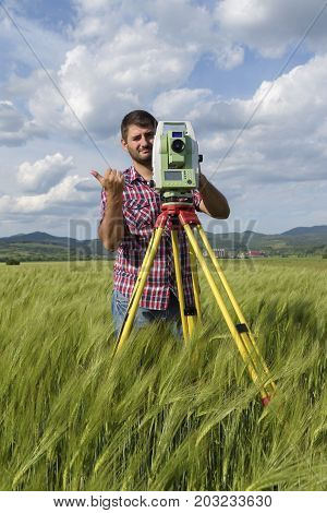 Total station Wheat field Engineer Surveyor Geodesy