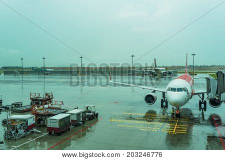 Jetway For Boarding Passengers Attached To The Airplane Changi Airport
