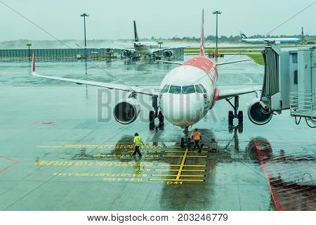 Jetway For Boarding Passengers Attached To The Airplane Changi Airport