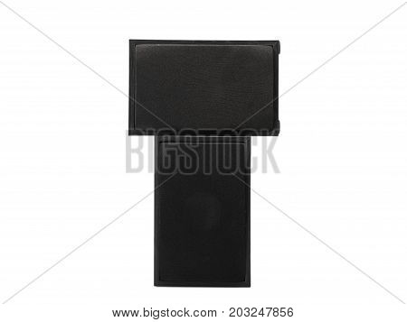 A close-up picture of two big black vintage loudspeakers standing on each other isolated on a white background. Audio equipment for sound quality. Entertainment, technology, music concept.