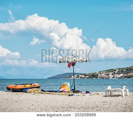 View from the Pantan beach in Trogir to the Ciovo island Croatia. Summer vacation. Destination scenic.