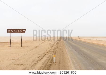 CAPE CROSS NAMIBIA - JUNE 29 2017: Directional sign to Sarah Se Gat a well known fishing spot on the Skeleton Coast of Namibia